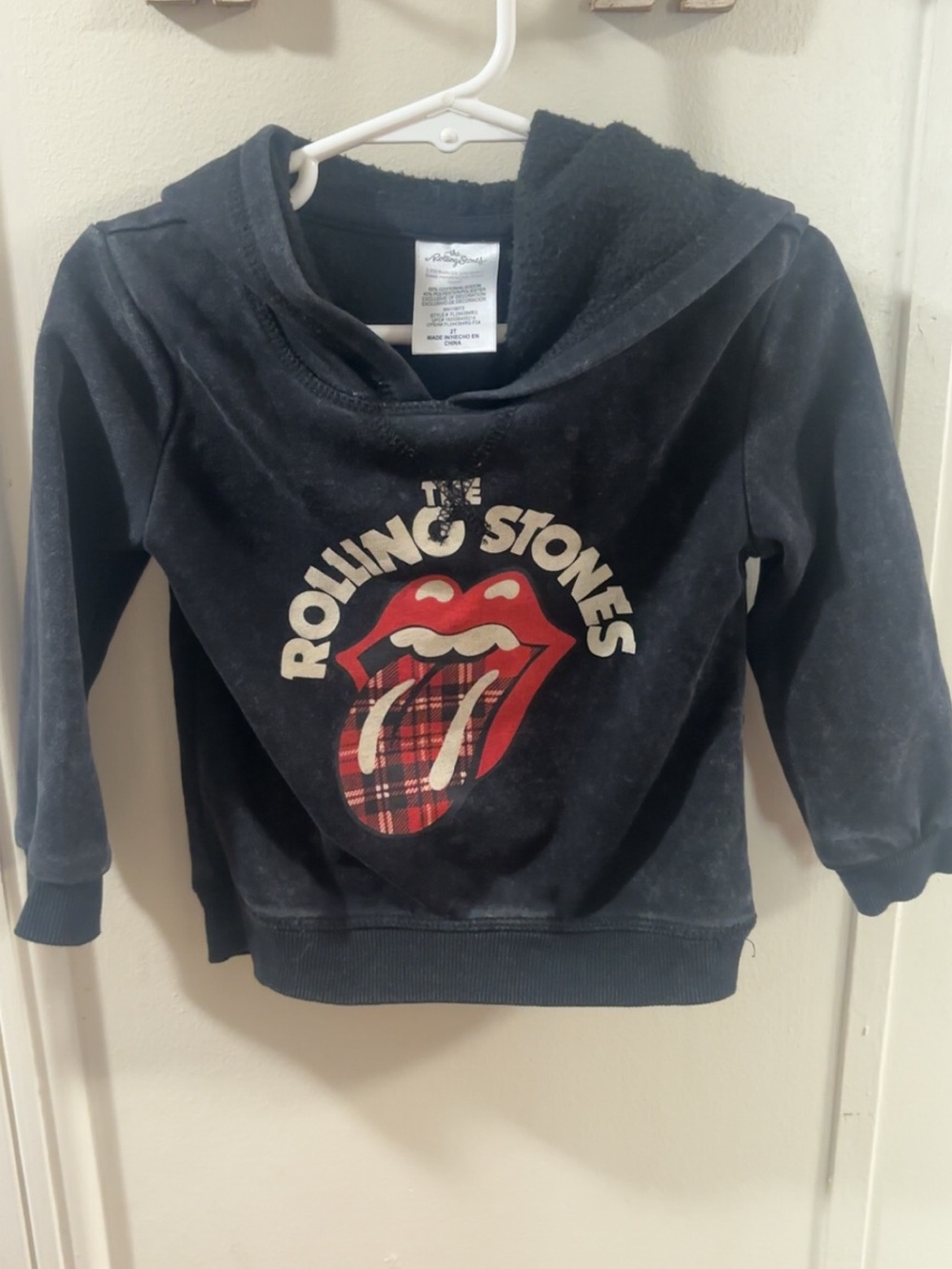 the Rolling Stones Kids Black Hoodie with Red Plaid Tongue Graphic